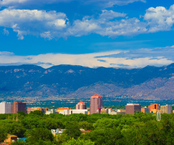 Albuquerque skyline, mountains, and clouds